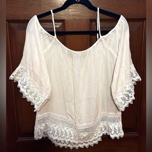 Woman’s medium American Eagle off the shoulder cream lace top